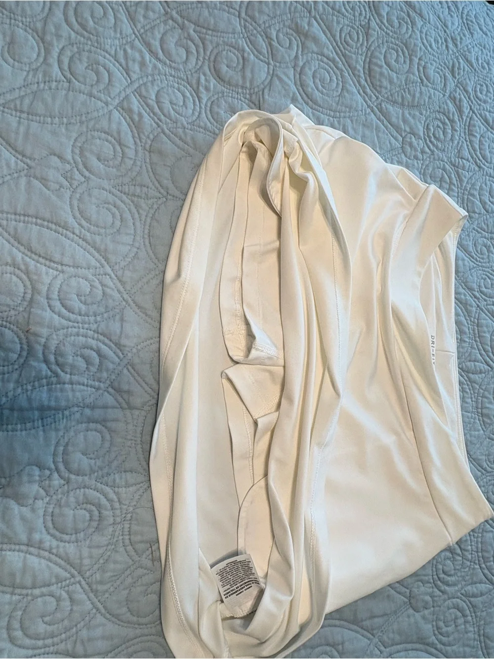 Nike Women's Cream Mini Athletic Skort with Silver Swoosh